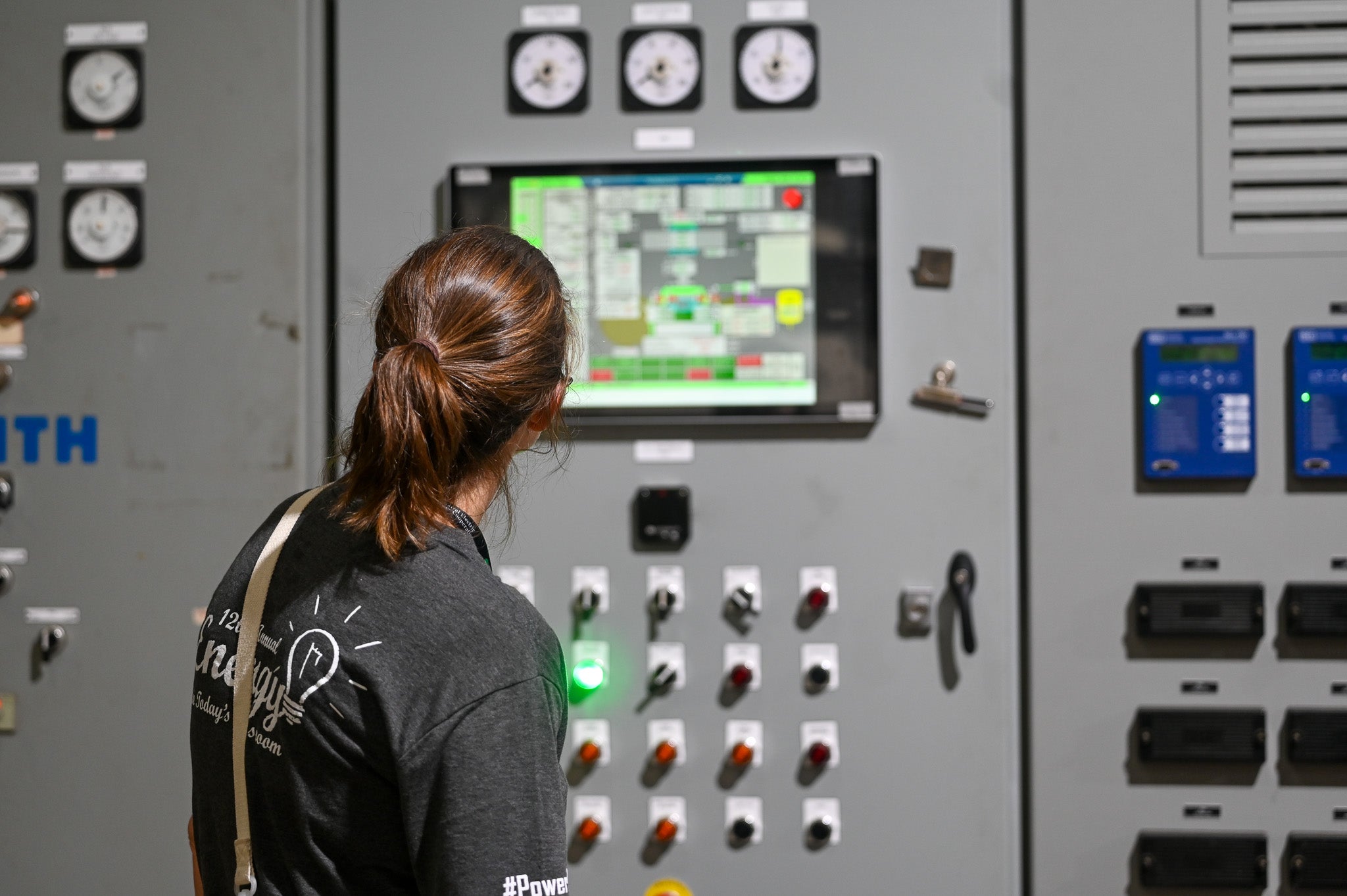Teacher observing control panel